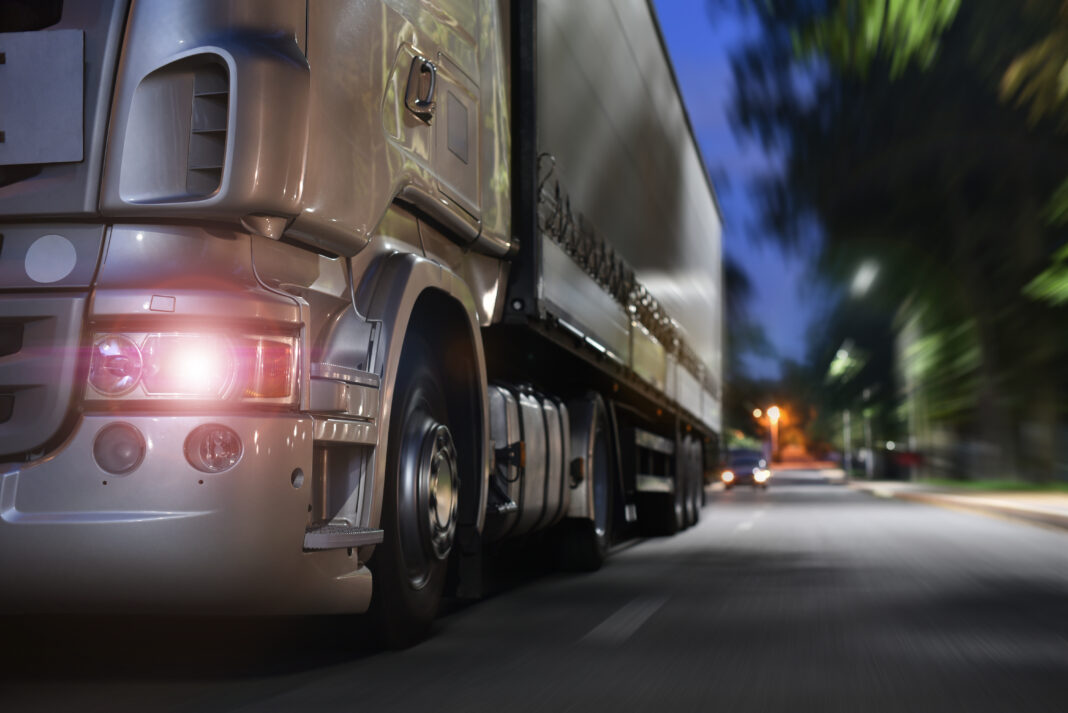 Truck,Drives,On,A,Night,Road big rig truck accident at night