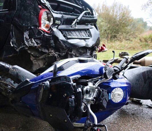 Mission Beach Motorcyclist Seriously Injured Crashed vehicle and motorcycle along the road following incident