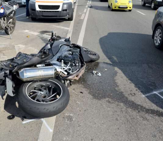 Mission Beach Motorcycle Crash Kills Two Motorcycle spread out across the road after crash