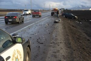 Car wrecked after highway crash off side of the road