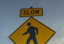 1 Pedestrian Dead, Following Highway 99 Crash in Lynnwood pedestrian crossing sign depicted