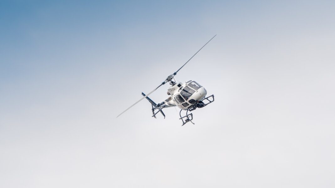 helicopter helicopter depicted in the air