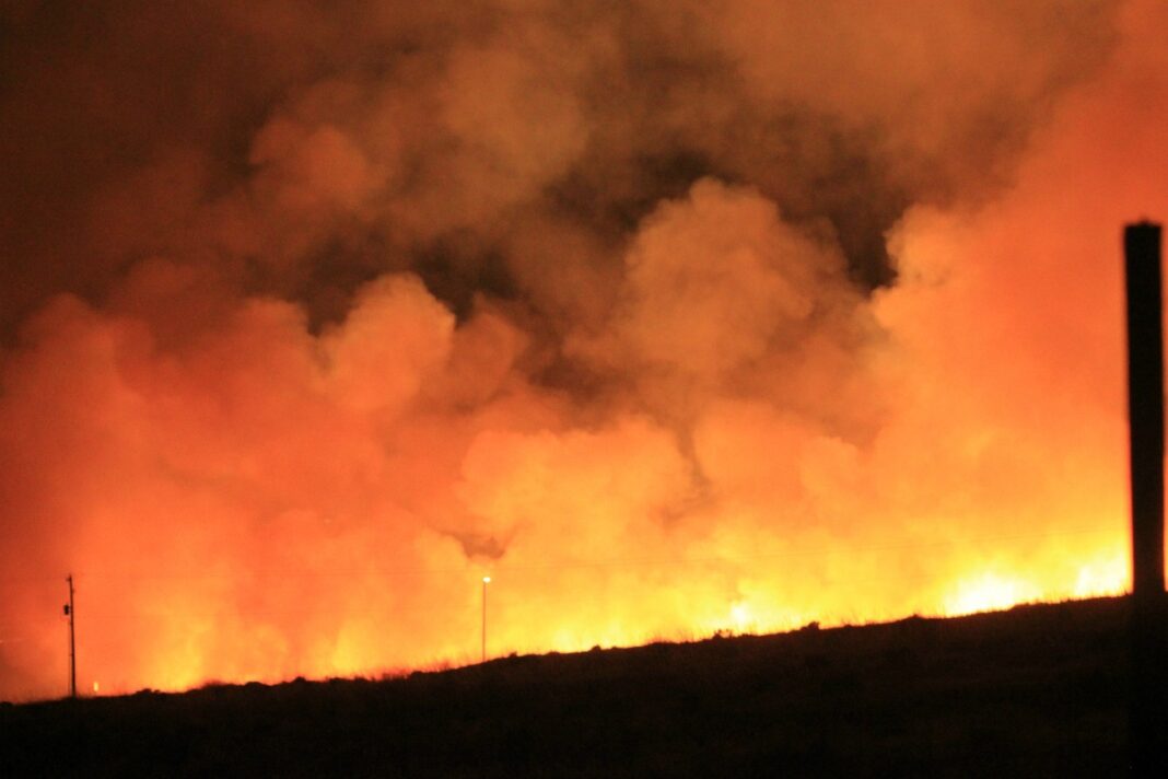 wildfire large wildfire and smoke depicted