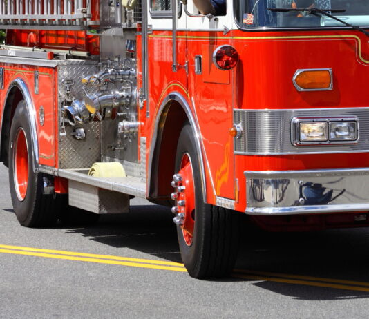 Commercial Building Catches Fire in Pearl City fire truck arrives to scene of building fire
