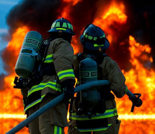 House Fire Near Cerrillos Kills One Firefighters attempt to extinguish large flames.