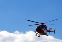 Helicopter Crashes Into Pedestrian Bridge in Huntington Beach, Injuring Several People Helicopter Crashes Into Pedestrian Bridge in Huntington Beach