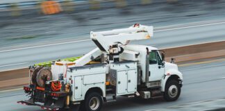 Fatal Wreck Involving D’Iberville Public Works Truck Closes Highway 15 utility truck