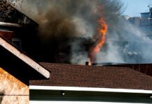 Gas Explosion Destroys House, Damages Another on Walker Drive in Northeast Albuquerque house on fire