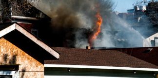 Gas Explosion Destroys House, Damages Another on Walker Drive in Northeast Albuquerque house on fire